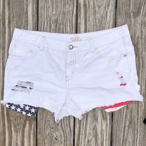 Justice shorts with American flag pockets.
